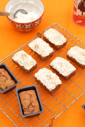 Gluten free and dairy free mini carrot cake loaves on wire rack