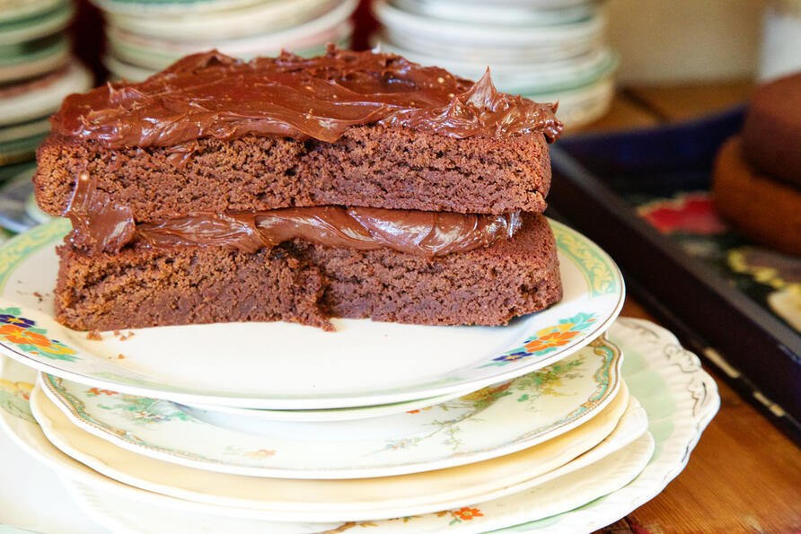 Chocolate sandwich cake on vintage plate