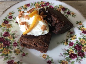 Gungy brownie in vintage bowl with ice cream