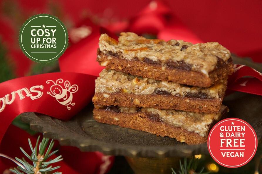 Stack of Mincemeat Crumble Slice cake slices with Christmas decoration