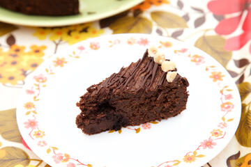 Gluten and dairy free Chocolate and Hazelnut Torte close up of slice on plate